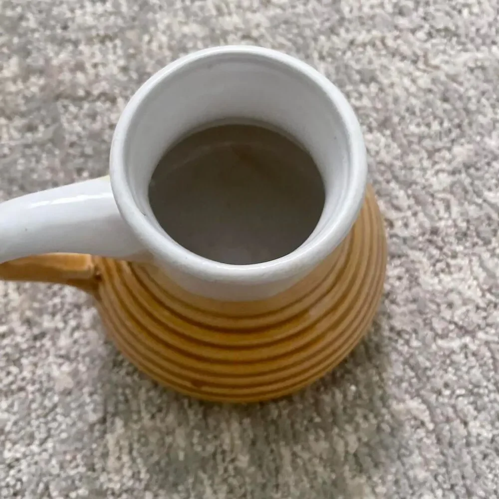 Source Unknown yellow white